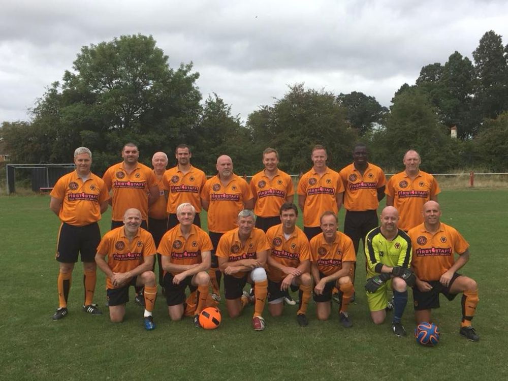 Neil Edwards with Wolves All-Stars team (third left front row)