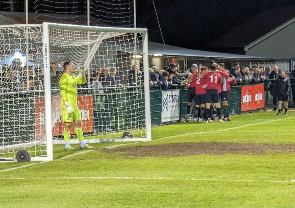 Sholing celebrate scoring against Wimborne