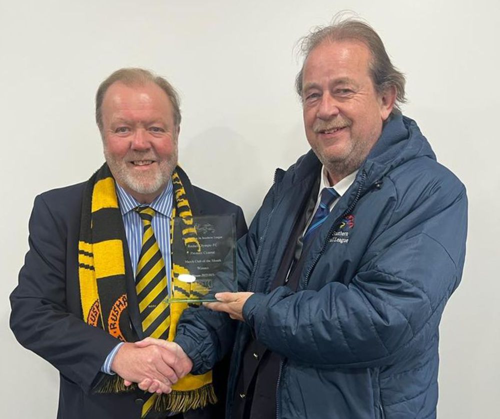Steve Hyde presents Rushall Olympic award to chairman John Allen