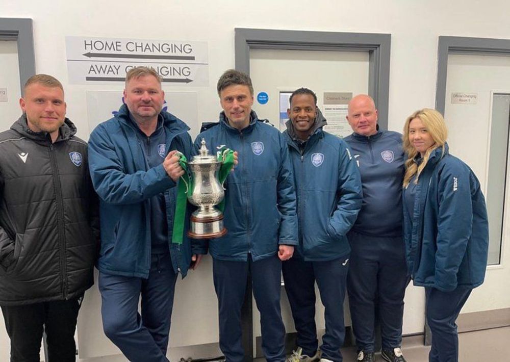 Gavin Macpherson and his staff after winning the Surrey Senior Cup