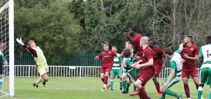 Eusebio Da Silva (4th City player from left) scores the winner (photo: Danny Loo Photography)