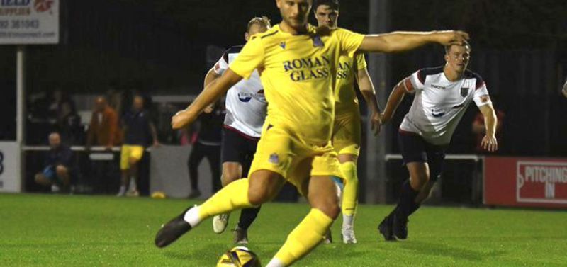 Owen Howe tucks away the spot-kick (Bristol Manor Farm)