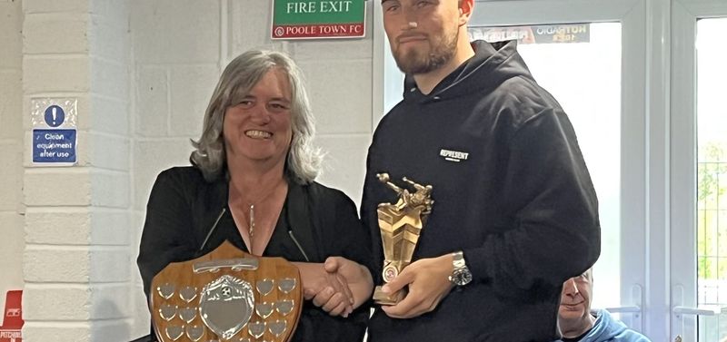 Poole striker Tony Lee receives his awards from Pippa Daniels