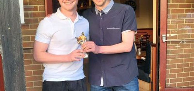 Charlie Philpott receiving his players` player of the year award