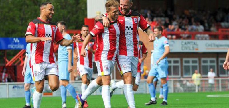 Ilkeston celebrate Jamie Ward's 25-yard effort